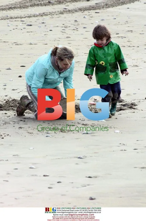 Coranation Street actress Debra Stevenson with son on beach