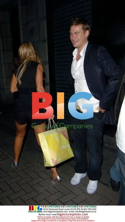 Singer Lee Ryan goofing around with girls