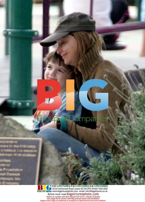 Calista Flockhart with son Liam and dog at park