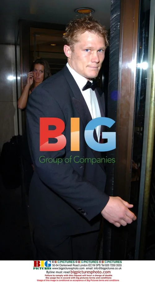 England Rugby Player Josh Lewsey Bumps Door