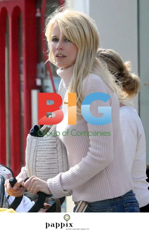 Claudia Schiffer Strolls with Son in London