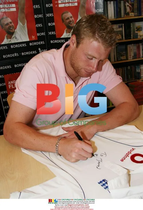 Andrew Flintoff signing book in Birmingham