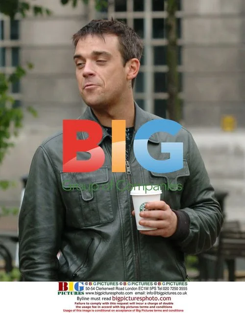 Robbie Williams visits Starbucks in Manchester
