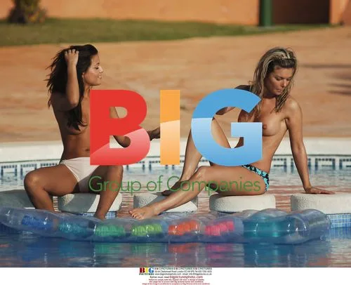Sexy models HANNAH JOY LEWIS AND JAKKI DEGG in pool in Spain
