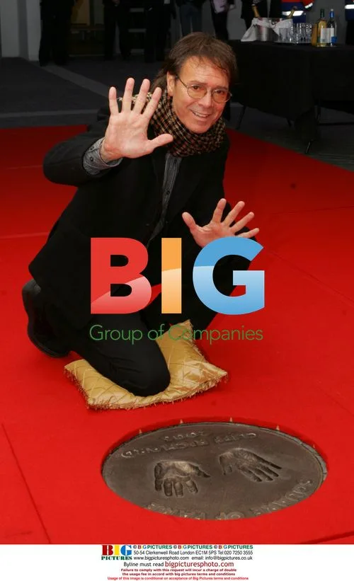 Sir Cliff Richards Imprints Hands in Concrete