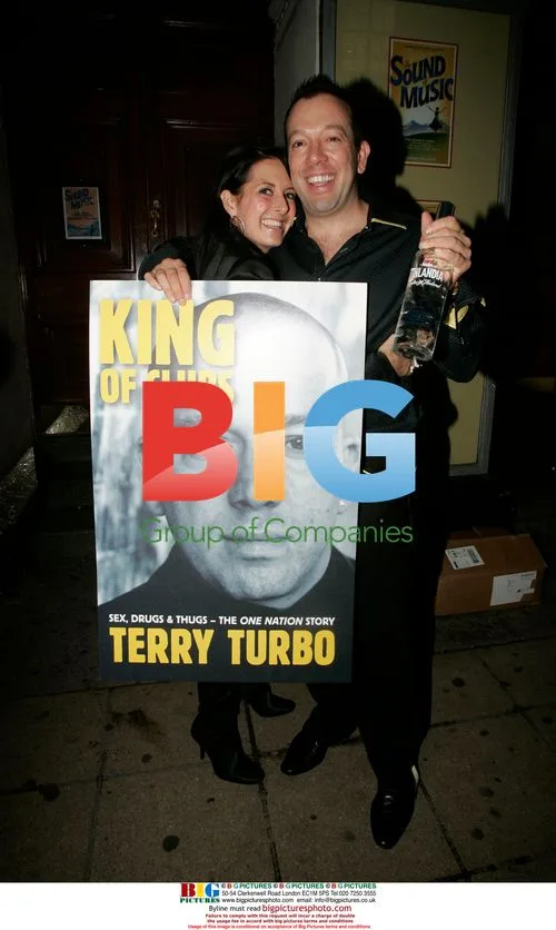 Terry Turbo and wife leave book launch party