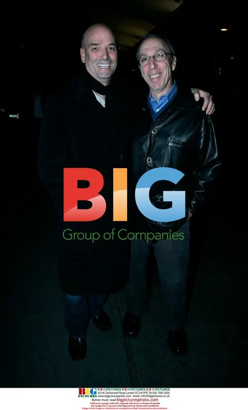 Martin Campbell and lawyer outside hotel