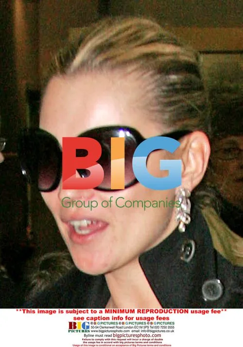 Kate Moss Arrives at Heathrow Airport