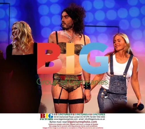 Kate Thornton, Russell Brand, and Patsy Kensit on stage