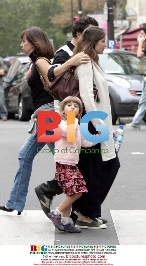 Laetitia Casta strolling in Paris with family