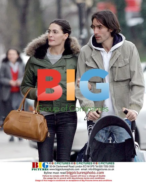 Arsenal's Robert Pires and girlfriend shop for baby