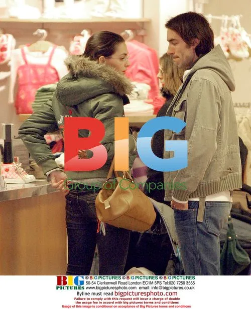 Robert Pires and girlfriend shop for baby in London