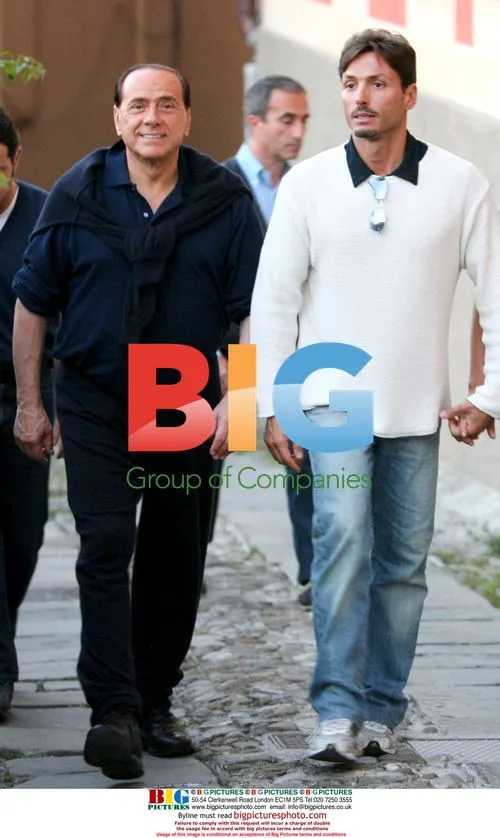 Silvio Berlusconi strolls with son in Portofino