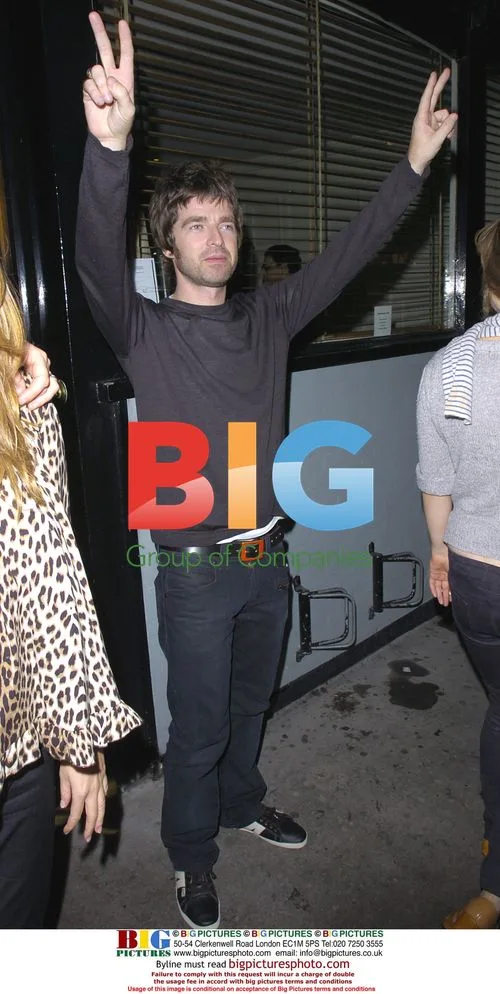 Noel Gallagher and Sara McDonald Leaving the Groucho Club
