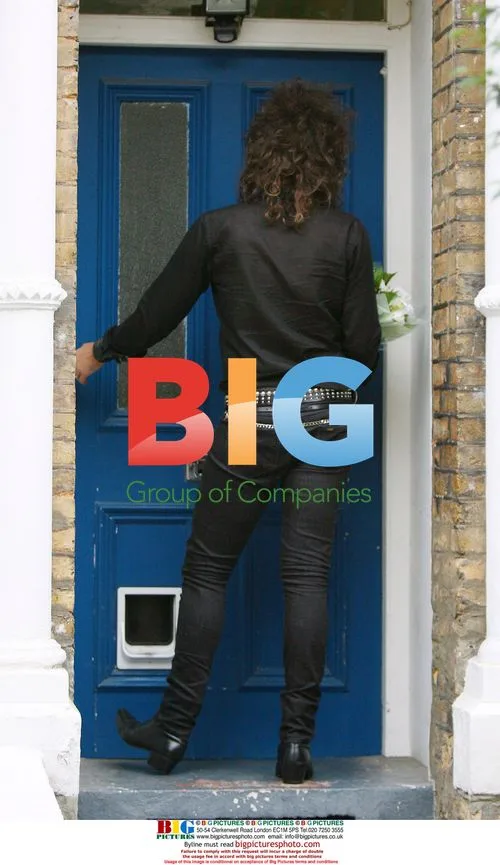 Coralie Arrives at Russell Brand's London Home