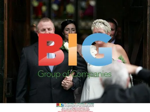 Charlie Brooks at her father's wedding