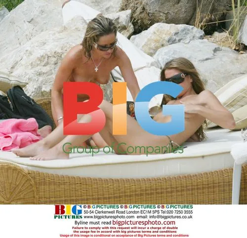 Sexy Girl Band Members Sunbathe in Mediterranean