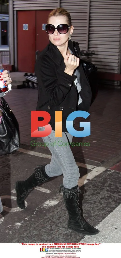 Kate Moss arrives at Heathrow airport