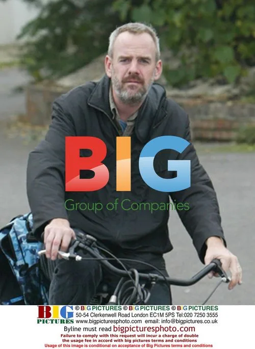 Norman Cook aka Fatboy Slim going shopping on bike