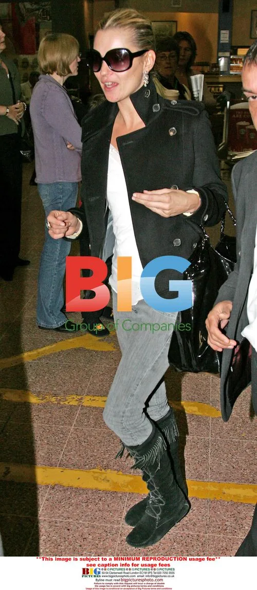 Kate Moss Arrives at Heathrow Airport