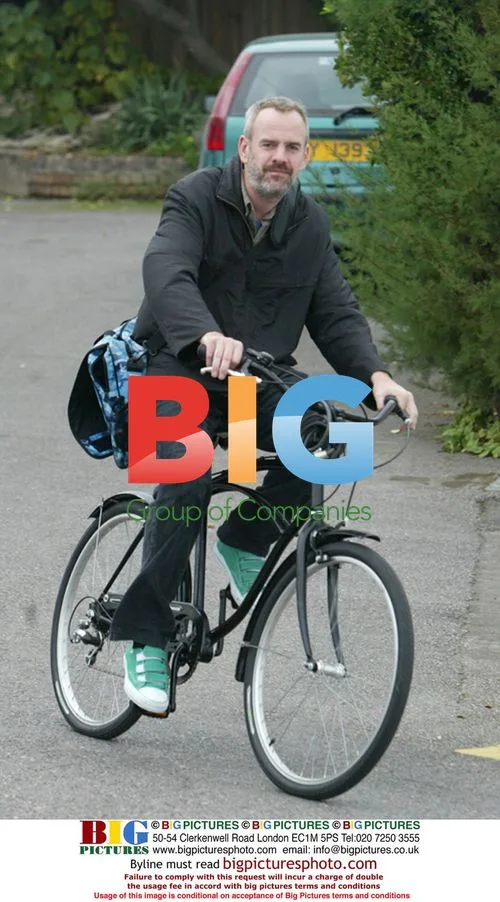 Fatboy Slim Goes Shopping on Bike in Hove