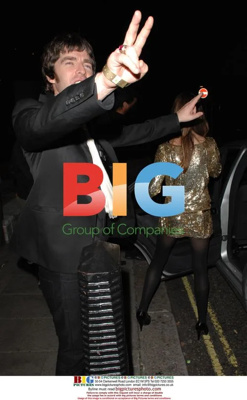 Noel Gallagher and Sara McDonald leaving Q awards party