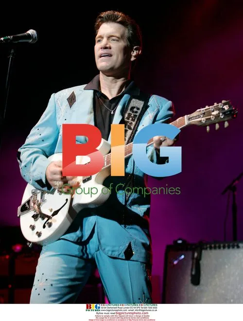 Singer Chris Isaac performing in concert
