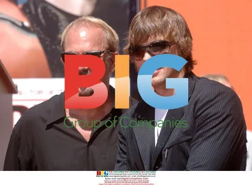 Kevin Costner and Ashton Kutcher at Grauman's Ceremony
