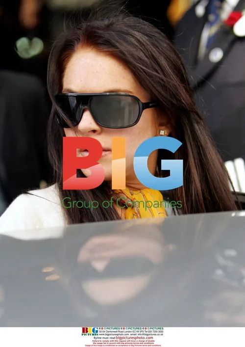 Lindsay Lohan Leaving Ritz Hotel with Boyfriend