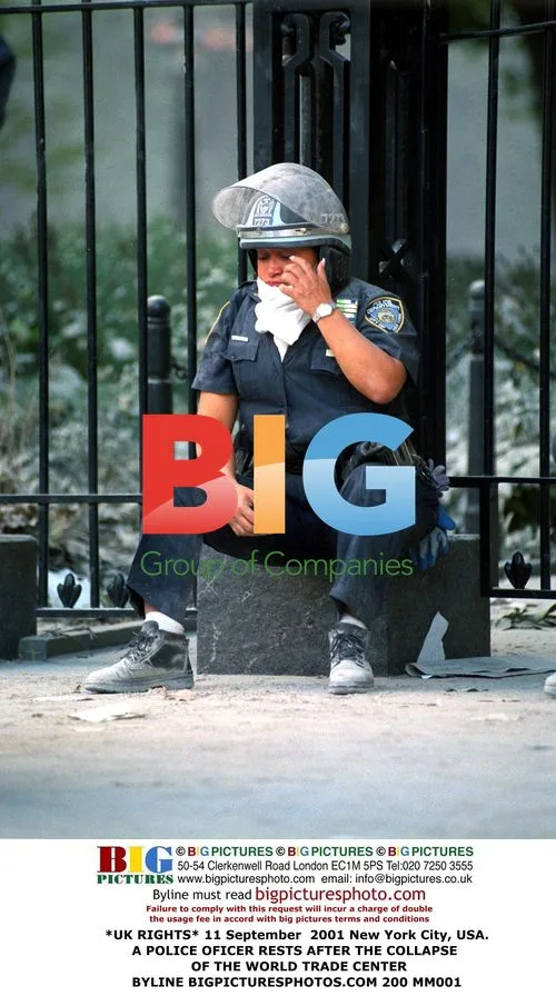 NYPD Officer Rests After 9/11 Attacks