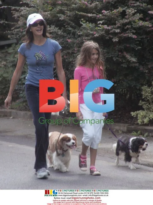 Teri Hatcher and daughter walk dogs