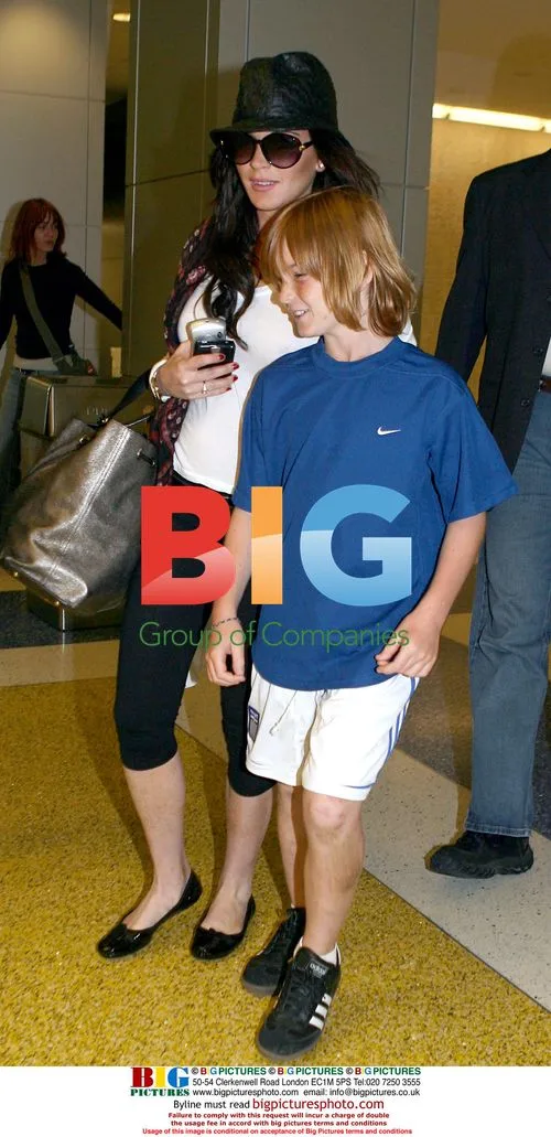 Lindsay Lohan Arrives at JFK with Boyfriend