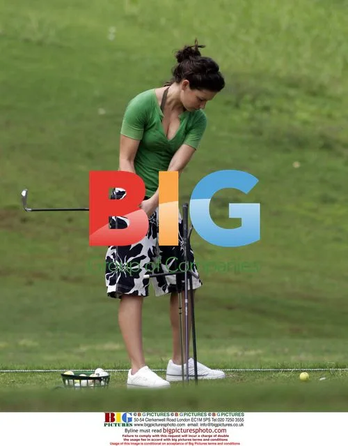 Evangeline Lilly golfing in Hawaii