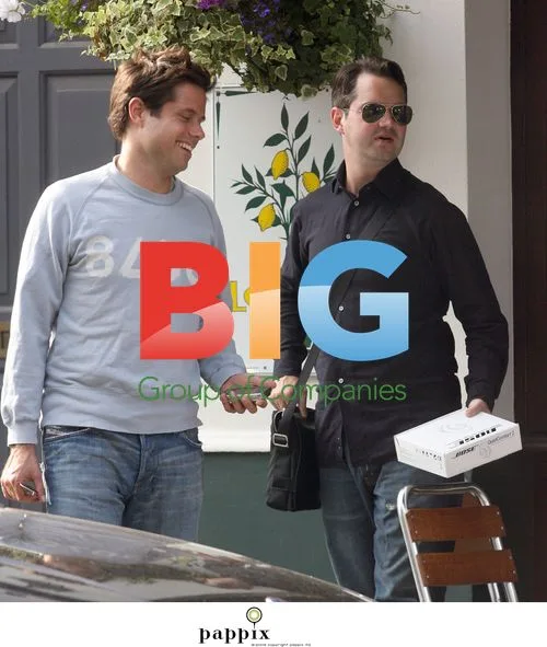 Jimmy Carr spotted getting touchy feely