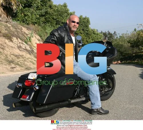 BILL GOLDBERG with his motorcycle collection