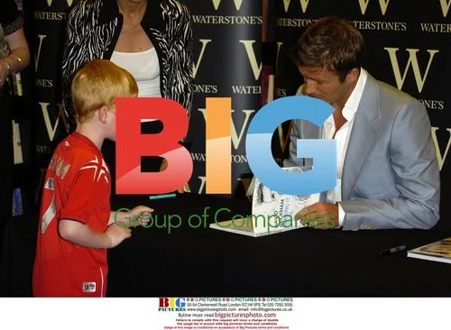 David Beckham signs book copies in London