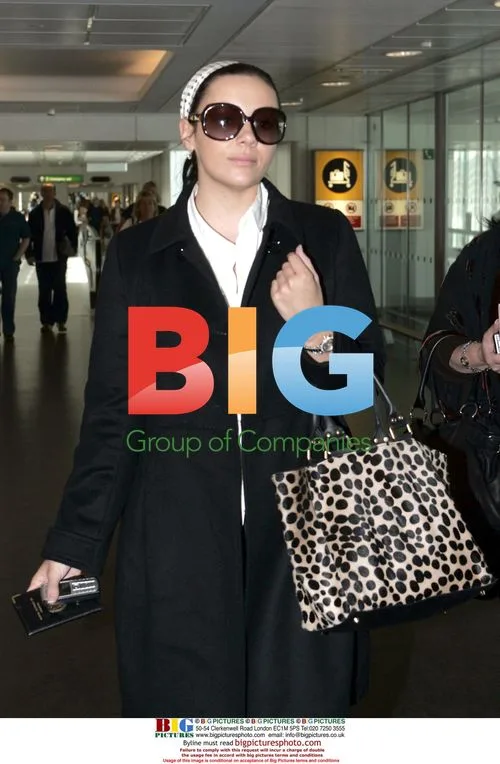 Martine McCutcheon at Heathrow airport