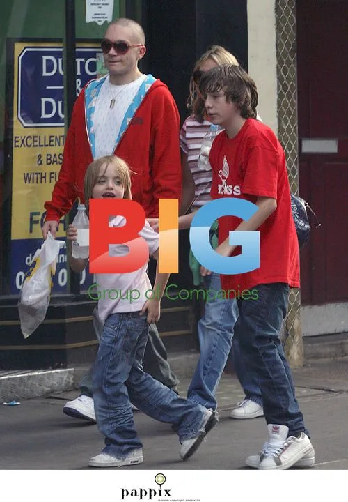 Patsy Kensit and boyfriend play with her sons