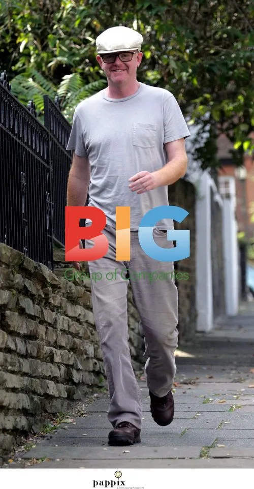 Chris Evans spotted in London with glasses and hat