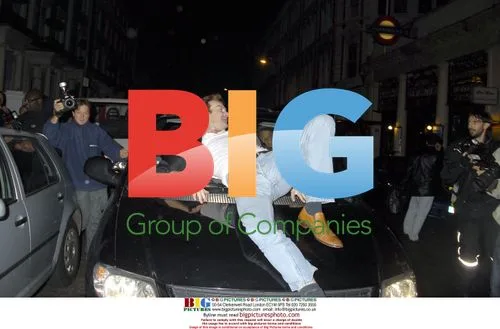 Jordan and Phil Turner leaving Boujis club