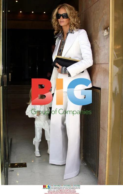 Elle Macpherson and ex Arpad Busson at son's christening