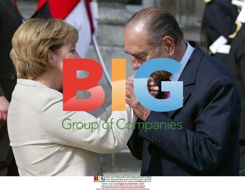 Chirac Kisses Merkel's Hand