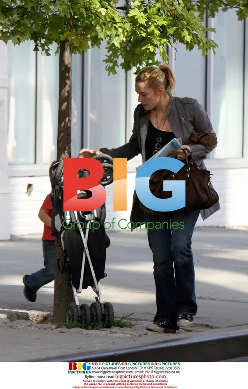 Kate Winslet juggles son Joe and stroller in NYC
