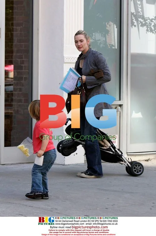 Kate Winslet juggles son and stroller in NYC