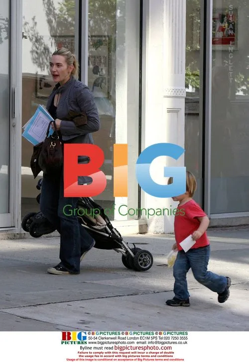 Kate Winslet juggles son Joe and stroller