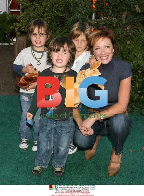 Lauren Holly and sons attend 'Open Season' premiere