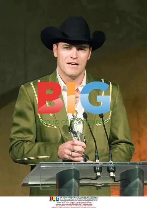 George Caynon accepts Country Recording award