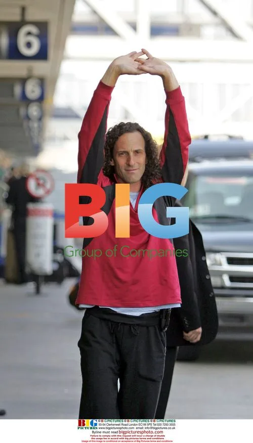 Kenny G Stretches at LAX