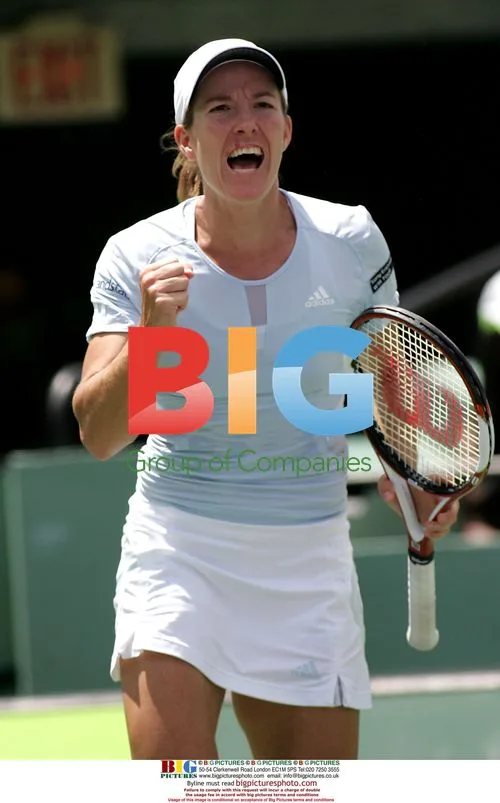 Henin Fist Pumps After Scoring Against Serena