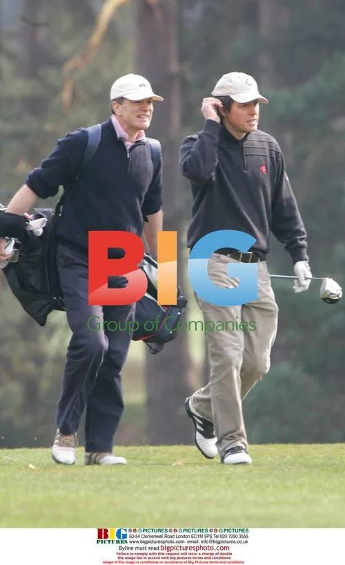 Hugh Grant playing golf at Sunningdale